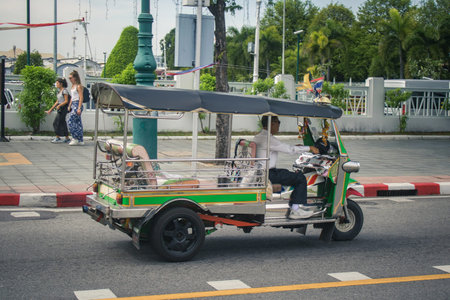 Bangkok, Thailand, November 25, 2024 Tuk Tuk rolling in the streets of Bangkok, capital of Thailand....