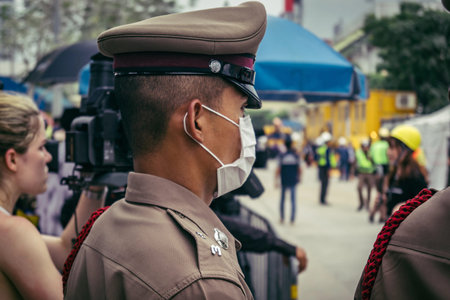 Bangkok, Thailand, March 31, 2025 Law enforcement are deployed to the site of a collapsed building...