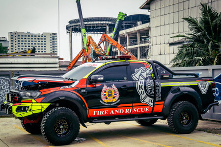 Bangkok, Thailand, March 31, 2025 Firefighters are deployed to the construction site of a building...