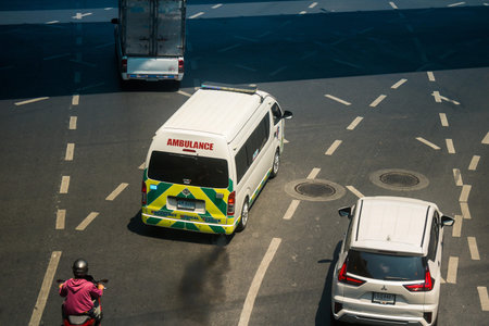 Bangkok, Thailand, March 06, 2025 Ambulance rolling in the streets of Bangkok, capital of Thailand,...