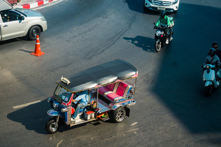 Bangkok, Thailand, March 06, 2025 Tuk Tuk rolling in the streets of Bangkok, capital of Thailand....