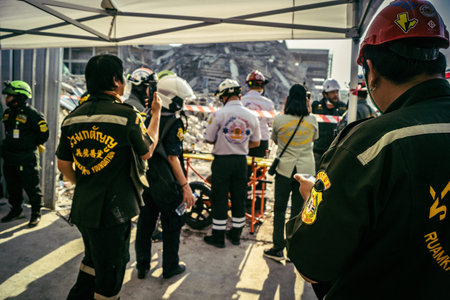 Bangkok, Thailand, March 28, 2025 Rescuers in Bangkok are at the site of a high-rise building under...