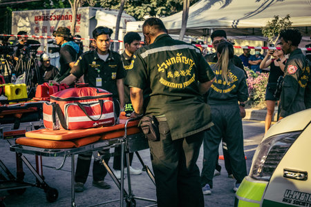 Bangkok, Thailand, March 28, 2025 Rescuers in Bangkok are at the site of a high-rise building under construction that collapsed after the earthquake struck the Thai capital.のeditorial素材