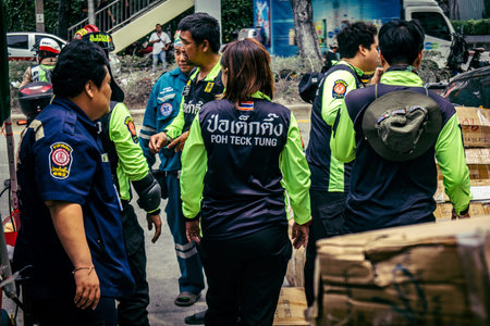 Bangkok, Thailand, April 02, 2025 Rescuers work at the site of a high-rise building under...