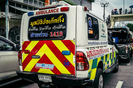 Bangkok, Thailand, April 02, 2025 Ambulances are at the site of a building under construction that...
