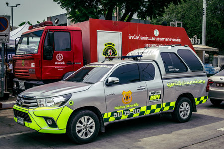 Bangkok, Thailand, April 02, 2025 Firefighters are deployed to the construction site of a building...