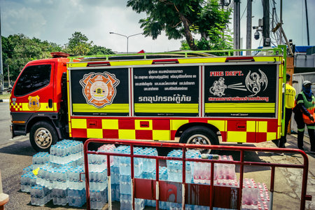 Bangkok, Thailand, April 02, 2025 Firefighters are deployed to the construction site of a building...