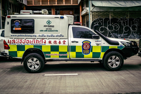 Bangkok, Thailand, April 02, 2025 Ambulances are at the site of a building under construction that...