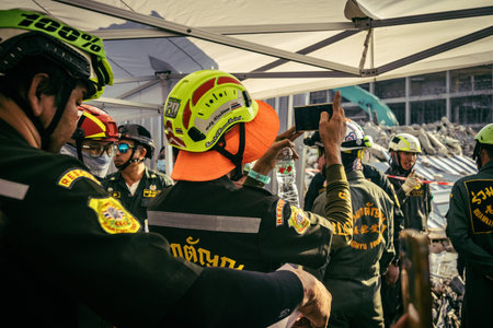 Bangkok, Thailand, March 28, 2025 Rescuers in Bangkok are at the site of a high-rise building under...