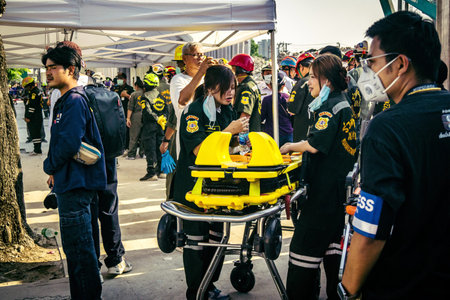 Bangkok, Thailand, March 28, 2025 Rescuers in Bangkok are at the site of a high-rise building under...