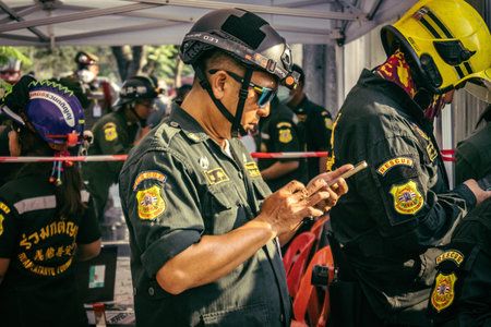 Bangkok, Thailand, March 28, 2025 Rescuers in Bangkok are at the site of a high-rise building under...