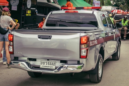 Bangkok, Thailand, March 31, 2025 Police cars are deployed to the site of a collapsed building after...