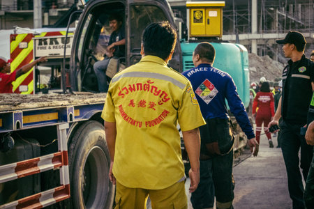Bangkok, Thailand, March 28, 2025 Rescuers in Bangkok are at the site of a high-rise building under...