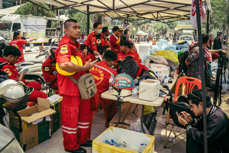 Bangkok, Thailand, March 29, 2025. Rescuers work at the site of a high-rise building under...