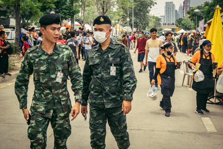 Bangkok, Thailand, March 31, 2025 Law enforcement are deployed to the site of a collapsed building...