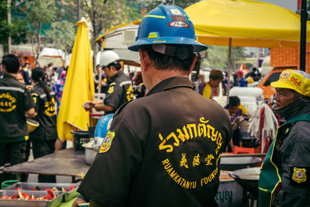 Bangkok, Thailand, March 31, 2025 Rescuers work at the site of a high-rise building under...