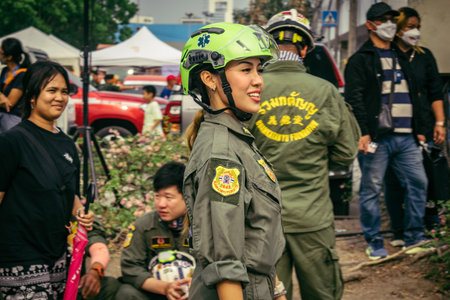 Bangkok, Thailand, March 31, 2025 Rescuers work at the site of a high-rise building under...