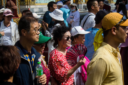 Bangkok, Thailand, December 12, 2024 Tourists visiting The Grand Palace, a complex of buildings at...