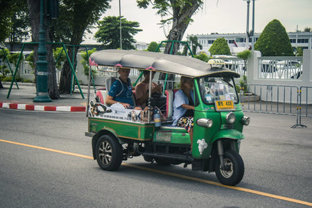 Bangkok, Thailand, November 25, 2024 Tuk Tuk rolling in the streets of Bangkok, capital of Thailand....