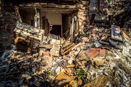 Kharkiv, Ukraine, June 9, 2025 A building damaged by a Russian ballistic missile attack. Civilians...