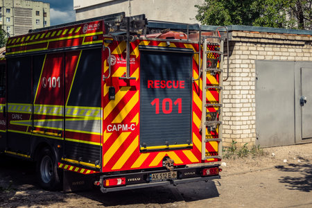 Kharkiv, Ukraine, June 11, 2025 Firefighters are responding to a residential building in Kharkiv...