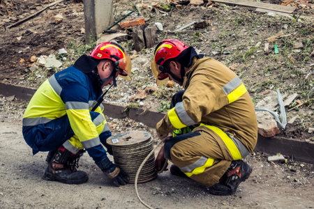 Kharkiv, Ukraine, June 11, 2025 Firefighters are responding to a residential building in Kharkiv...