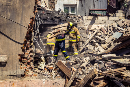 Kharkiv, Ukraine, June 11, 2025 Firefighters are responding to a residential building in Kharkiv...