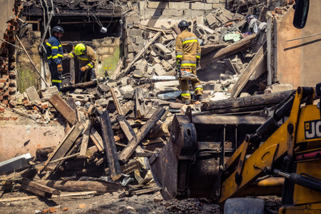 Kharkiv, Ukraine, June 11, 2025 Firefighters are responding to a residential building in Kharkiv...