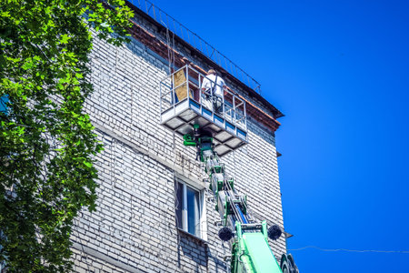 Kharkiv, Ukraine, July 6, 2025 Technical services are responding to a damaged building in Kharkiv,...