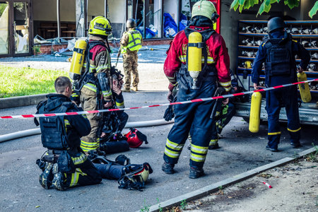 Kharkiv, Ukraine, July 7, 2025 Firefighters are responding to a residential building in Kharkiv that...