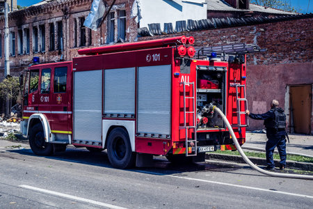 Kharkiv, Ukraine, July 7, 2025 Fire trucks are parked in the city center of Kharkiv who was hit by...