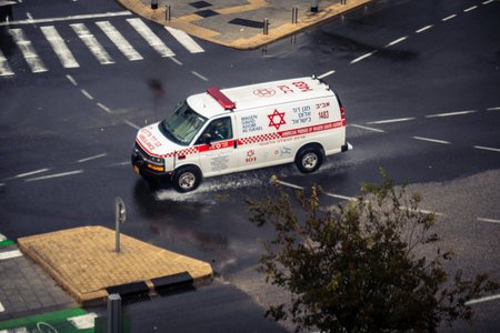 Tel Aviv, Israel,  December 29, 2025. Magen David Adom (MDA) ambulance driving with emergency lights...