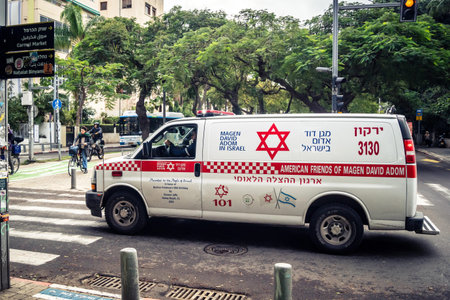Tel Aviv, Israel, January 14, 2026 Magen David Adom (MDA) ambulance driving with emergency lights...