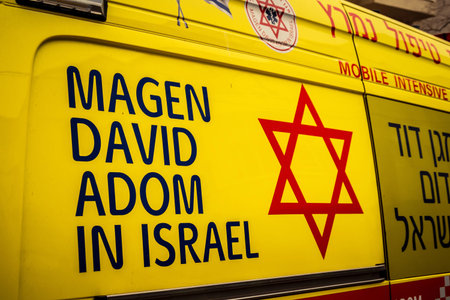 Tel Aviv, Israel, March 14, 2026 An ambulance is parked on a city street as a dense Sharav sandstorm...