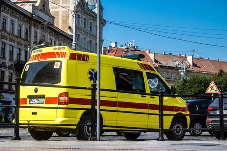 Lviv, Ukraine, August 30, 2024 Ambulance runs through downtown Lviv during the war with Russia. Lviv...