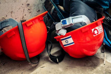 Tel Aviv, Israel, March 4, 2026 Civilian volunteers clearing glass and concrete debris after the...