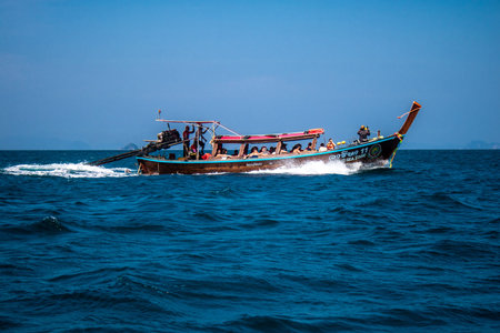 Krabi, Thailand, January 07, 2025 A long-tail boat is a traditional Thai wood boat that is a common sight in southern Thailand. used for a variety of purposes, including transporting tourists.
