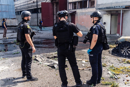 Kharkiv, Ukraine, July 24, 2025 War crimes prosecutors is gathering evidence following the attack on Kharkiv city, which was hit by  Russian KAB aerial bombs. The street was completely devastated.