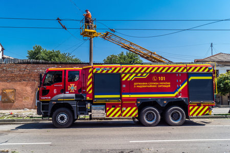 Kharkiv, Ukraine, July 7, 2025 Fire trucks are parked in the city center of Kharkiv who was hit by Russian Shahed drones. The street it totally devastated and the damage was extensive.