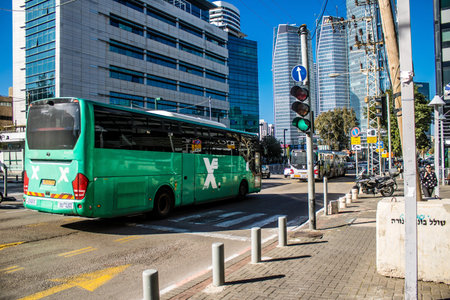 Tel Aviv, Israel, March 4, 2024 Local bus rolling in downtown Tel Aviv, an emblematic city of Israel. The lines are numerous and cost very cheap, it is a good means of transport to move this