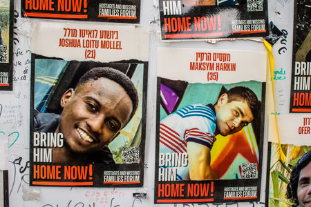 Tel Aviv, Israel, February 18, 2024 Posters depicting the faces of hostages kidnapped by Hamas during the terrorist attack of October 7, 2023 are displayed on the streets of Tel Aviv
