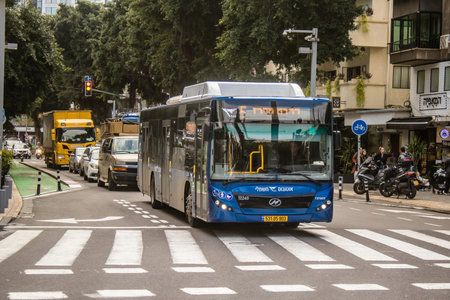 Tel Aviv, Israel - January 28, 2024 Local bus driving in the downtown of Tel Aviv, an emblematic and iconic city of Israel