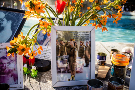 Tel Aviv, Israel - January 20, 2024 Dizengoff Square memorial, gifts and photos depicting the faces of hostages and soldiers killed by Hamas during the October 7, 2023 terrorist attack are on display