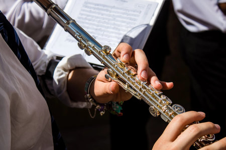 Music band participating at the Corpus Christi procession, an age-old tradition of the Catholic faith to process the real presence of Jesus. Eucharistic processions take place in the narrow streets of the old town of Carmona which is reputed to be one of 