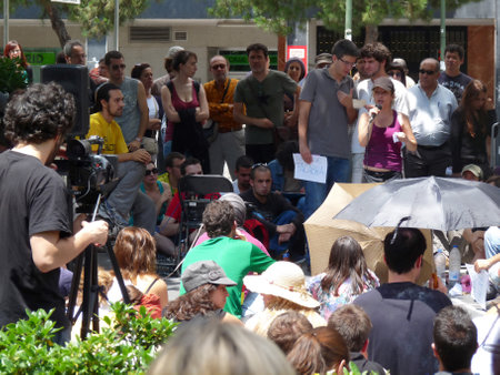 Madrid, Spain; June 4 2011. Young girl speaking at a neighborhood assembly in the Prosperidad neighborhood in Madrid. 15-M Movement. Photography taken on June 4 2011 in Madrid, Spainのeditorial素材