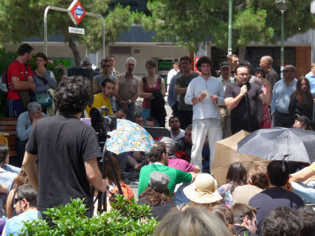 Madrid, Spain; June 4 2011. Middle-aged man speaking at a neighborhood assembly in the Prosperidad neighborhood in Madrid. 15-M Movement. Photography taken on June 4 2011 in Madrid, Spainのeditorial素材