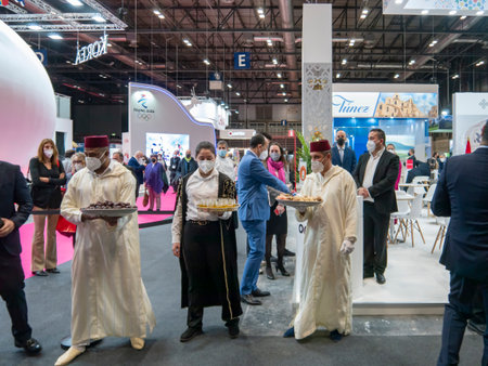 Madrid, Spain; January 19 2022. Attendees with dates, tea and traditional Arab sweets on trays, awaiting the arrival of the King and Queen of Spain in FITUR (International Tourism Trade Fair). Photography taken on January 19, 2022 in Madrid, Spain.のeditorial素材
