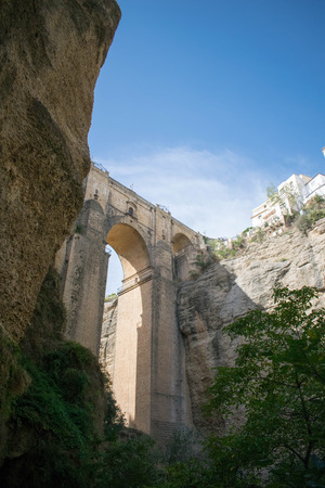 a shot underneath the bridge at Ronda, Spainの写真素材