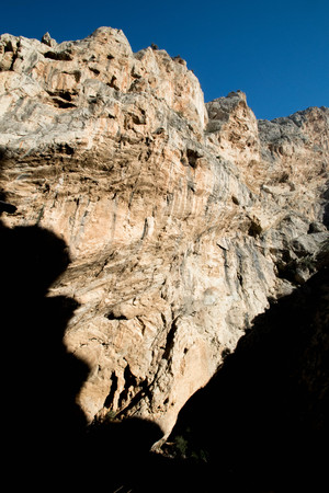 a cliff face from a low angle whilst hiking in Malaga, Spainの写真素材
