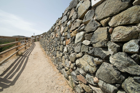 a cobble wall leading to a new journey in Spainの写真素材